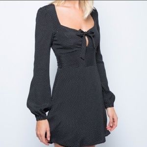Kali B&W polka dot puff sleeve dress.